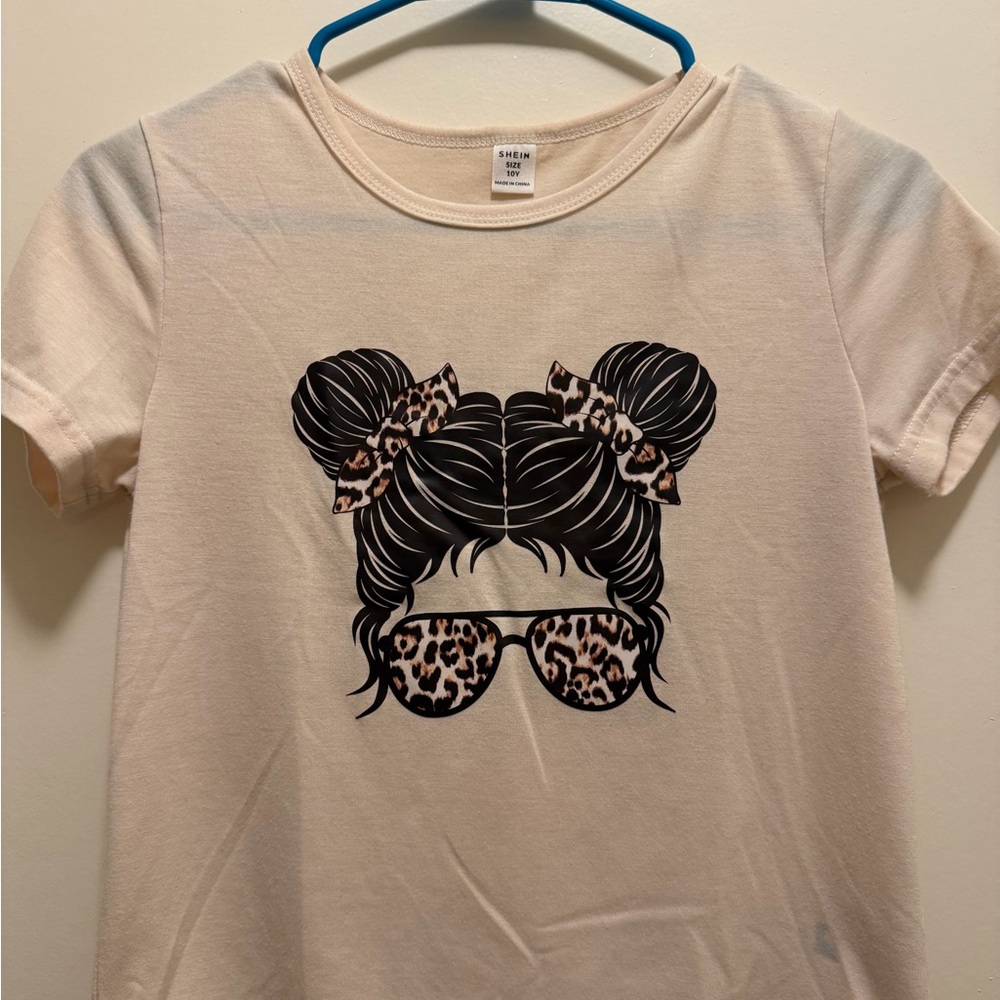 SHEIN Cream Tee with Black Hair Graphic and Leopard Print Accents